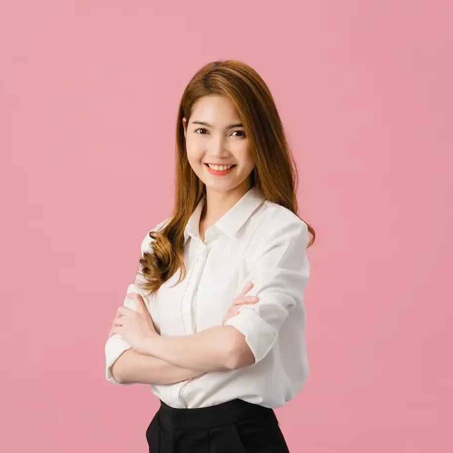 portrait-young-asia-lady-with-positive-expression-arms-crossed-smile-broadly-dressed-casual-clothing-looking-camera-pink-background_7861-3201
